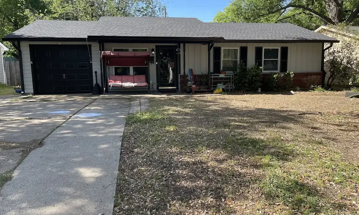 Asphalt Shingle Roof Repair crew at work on a residential roof in Palmetto